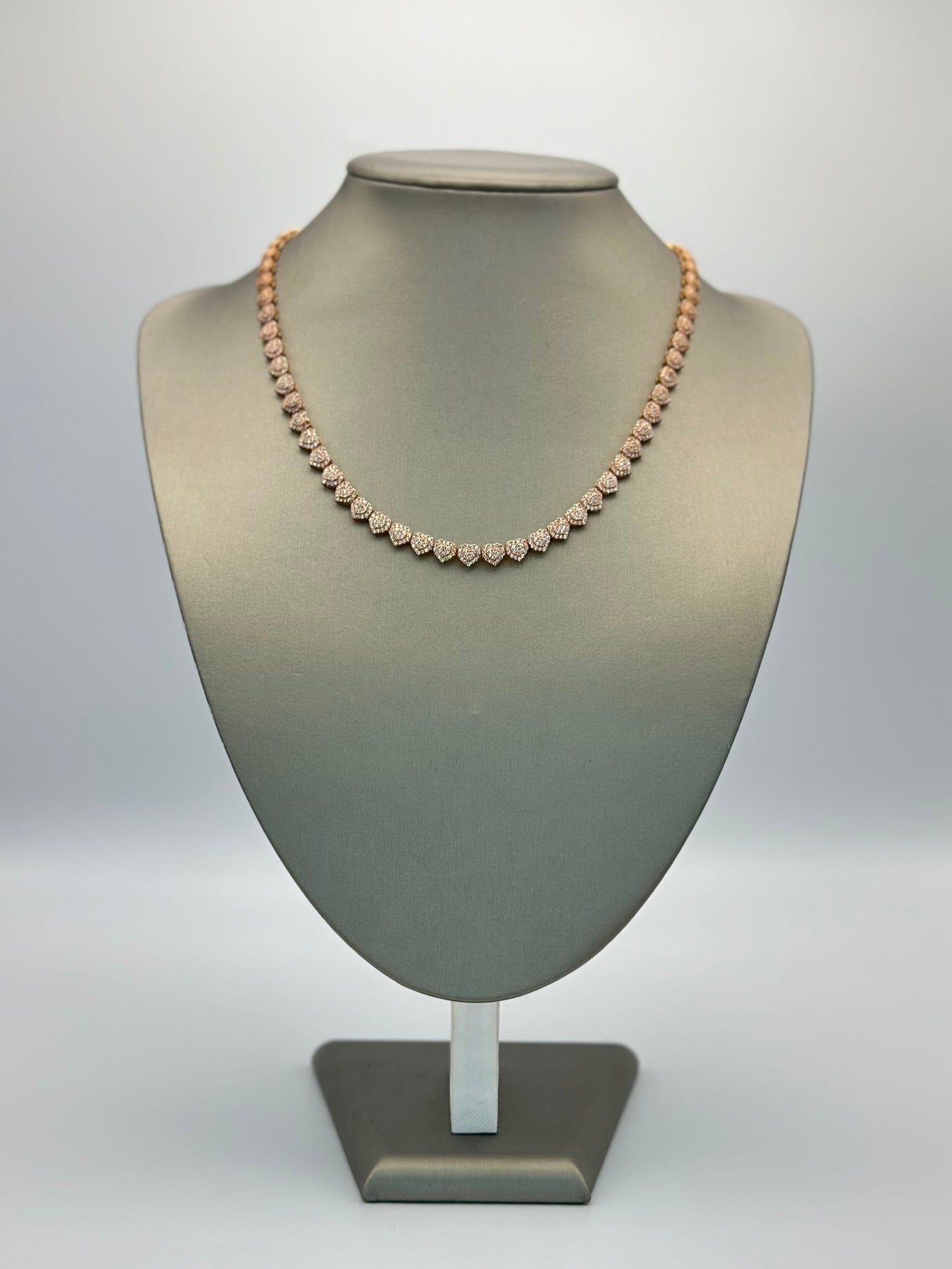 Choker with heart design.