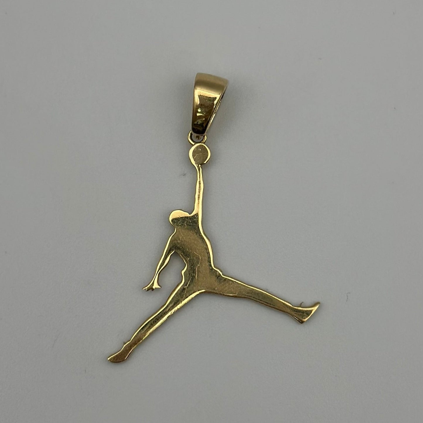 Pendant with sport logo.