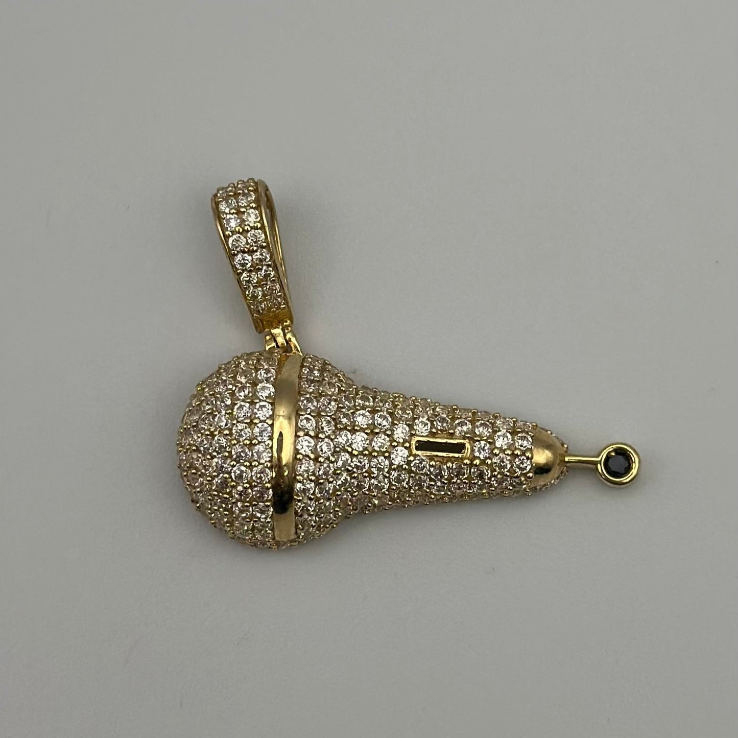 Microphone pendant with zirconia.