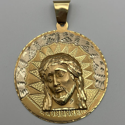 Solid pendant with Jesus design.