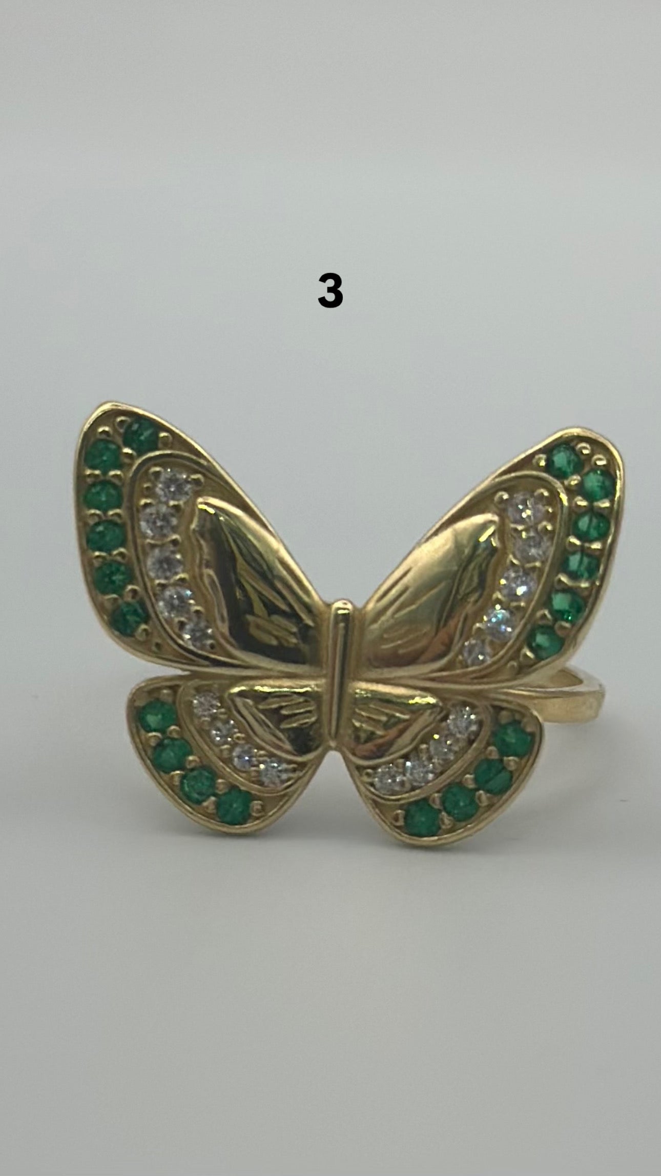 Butterfly ring.