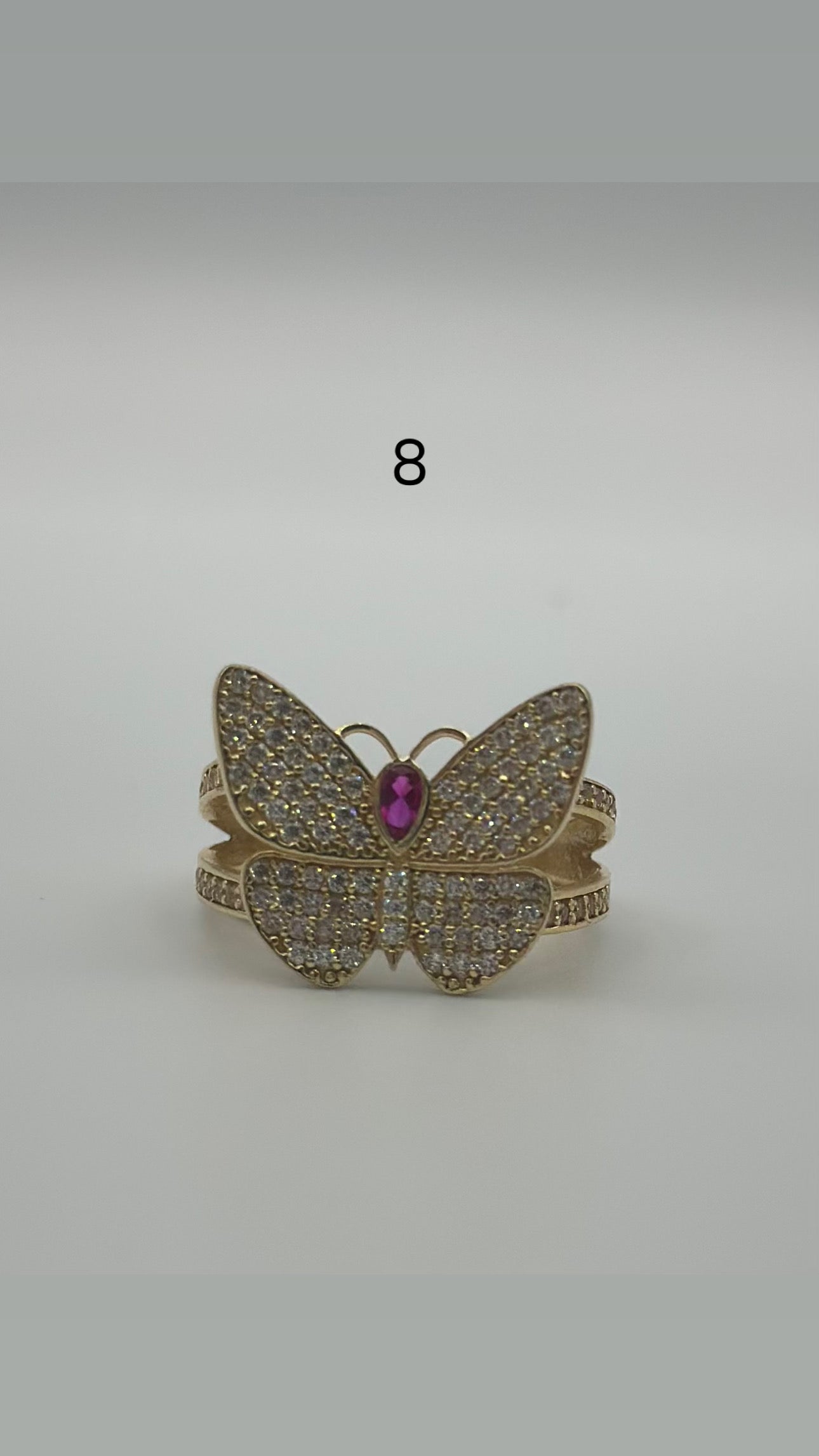 Butterfly ring.