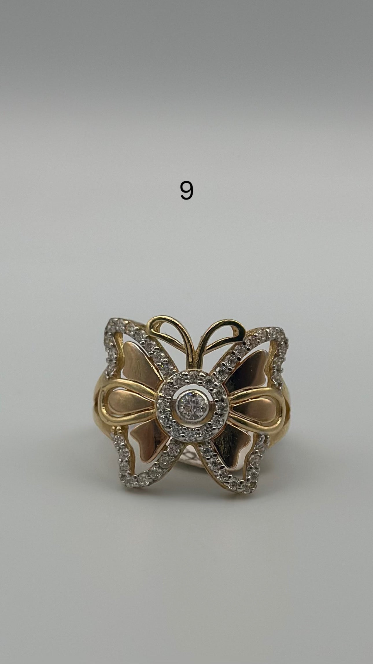 Butterfly ring.