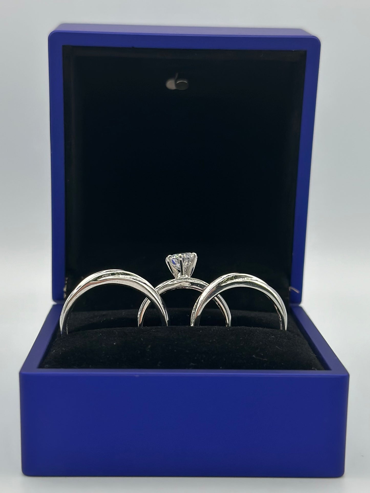 White trio of wedding ring .