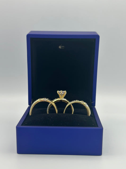 Trio of double tone wedding rings.