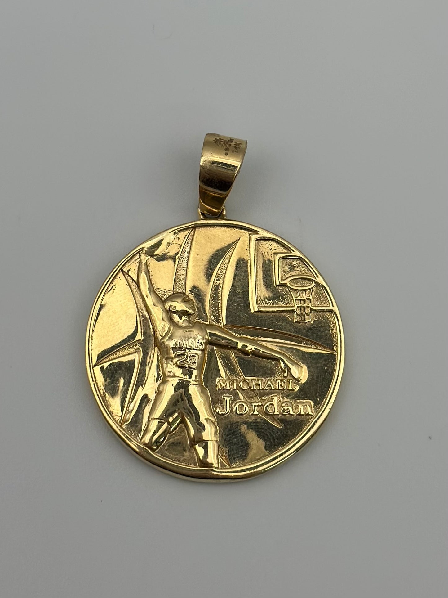 Reversible bulls medal.