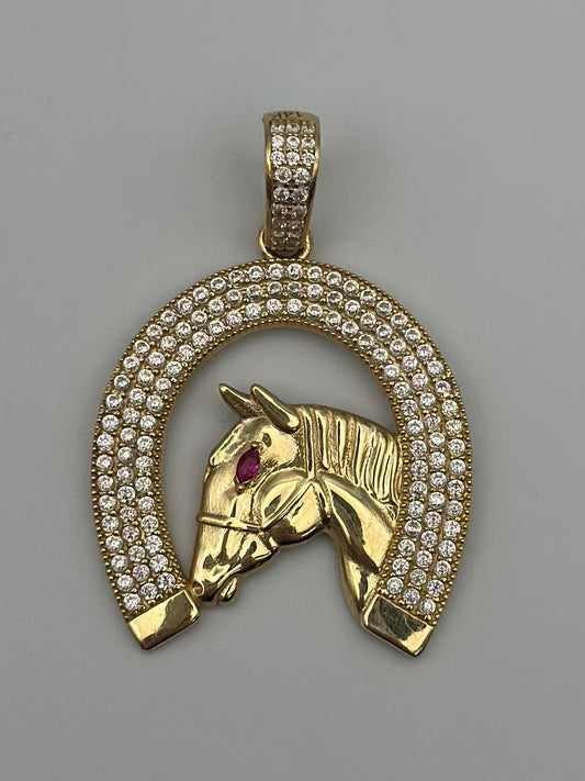 Horseshoe pendant with zirconia .