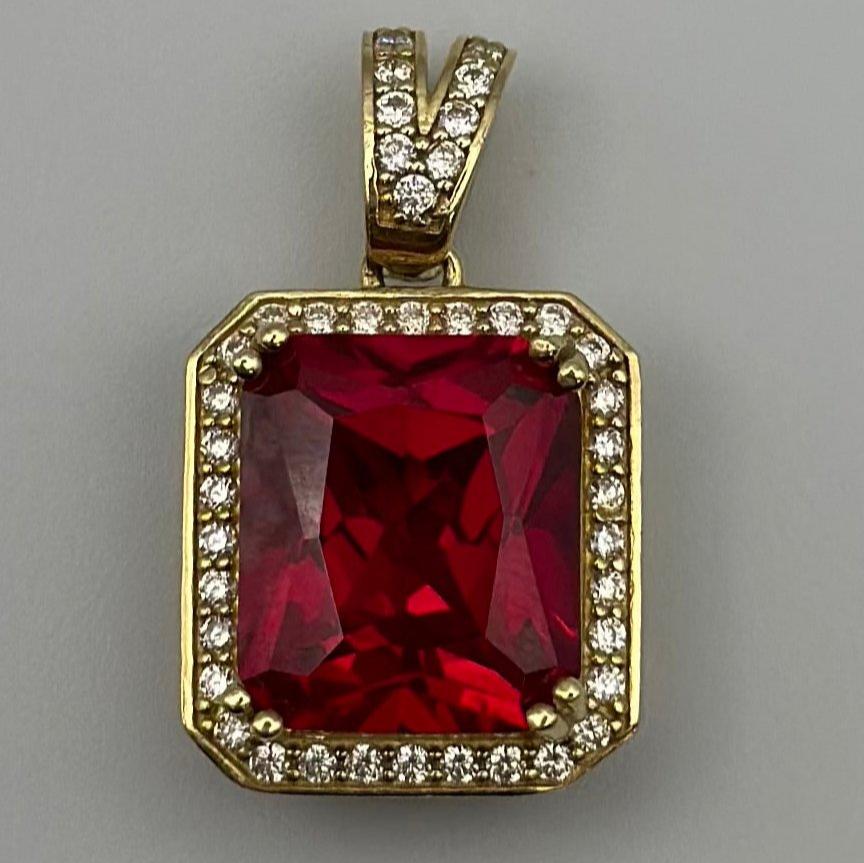 Medal with red zirconia.