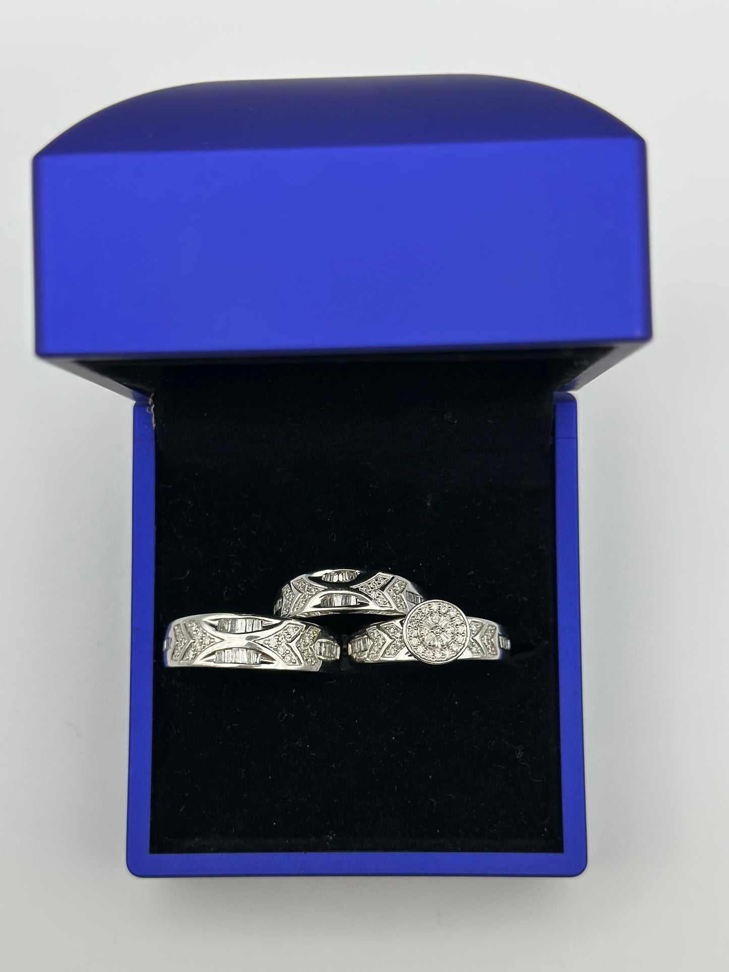 White diamond wedding ring trio.