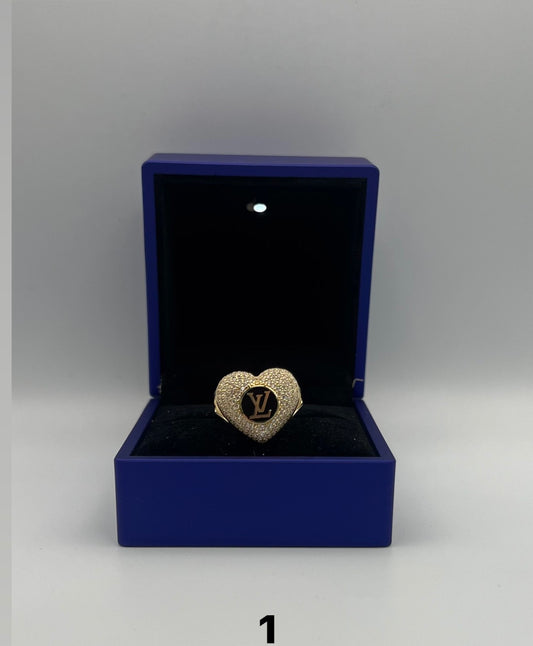 Heart ring with design.