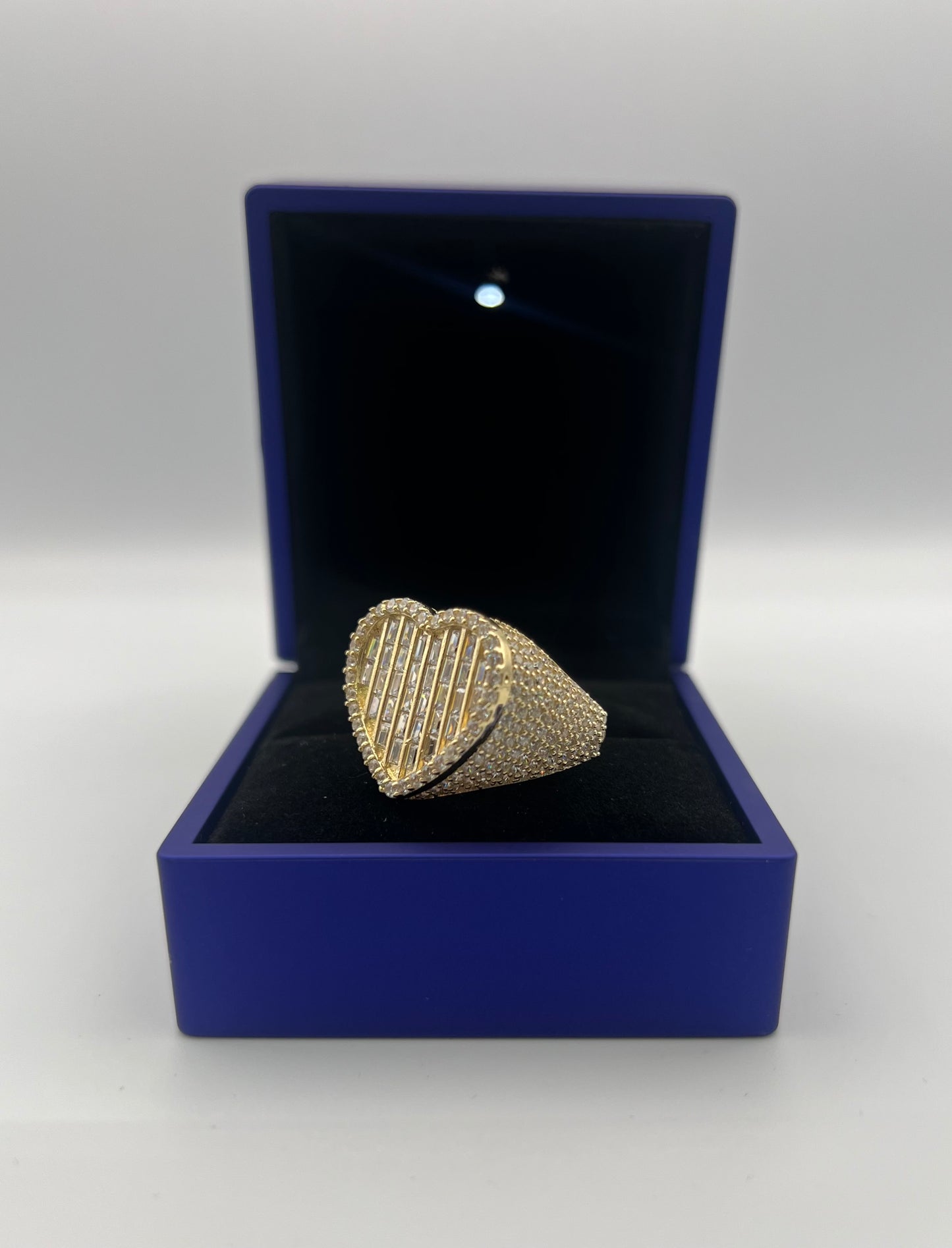 Ring with heart design in crystals.