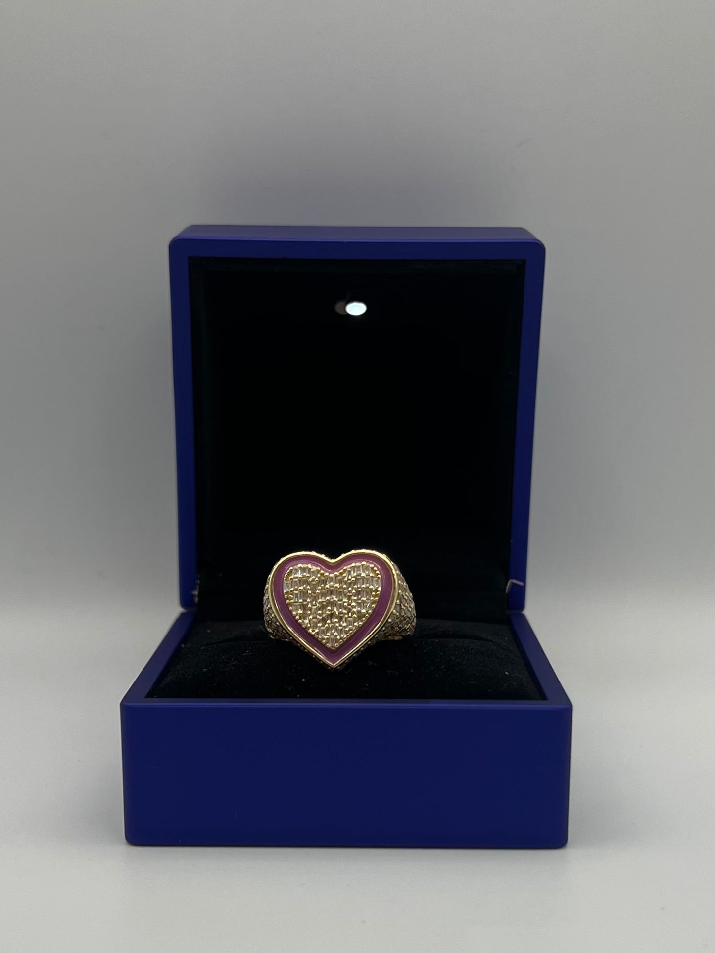 Heart design ring in color.