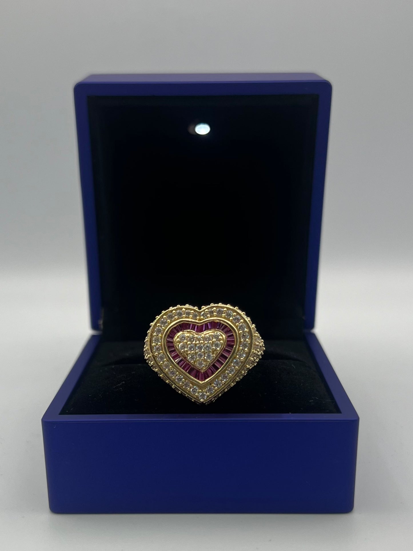 Pink heart design ring .