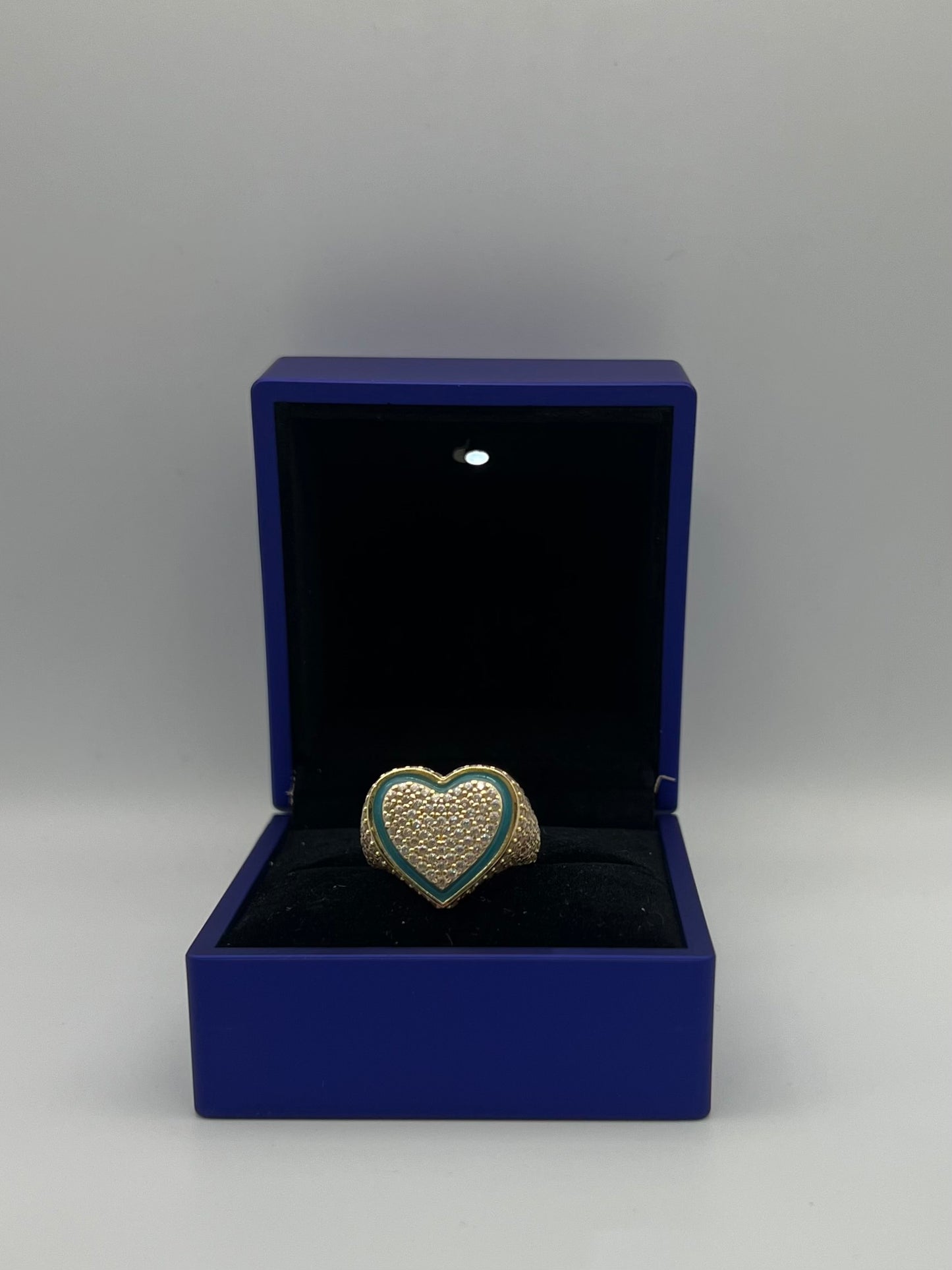 Heart design ring in color.