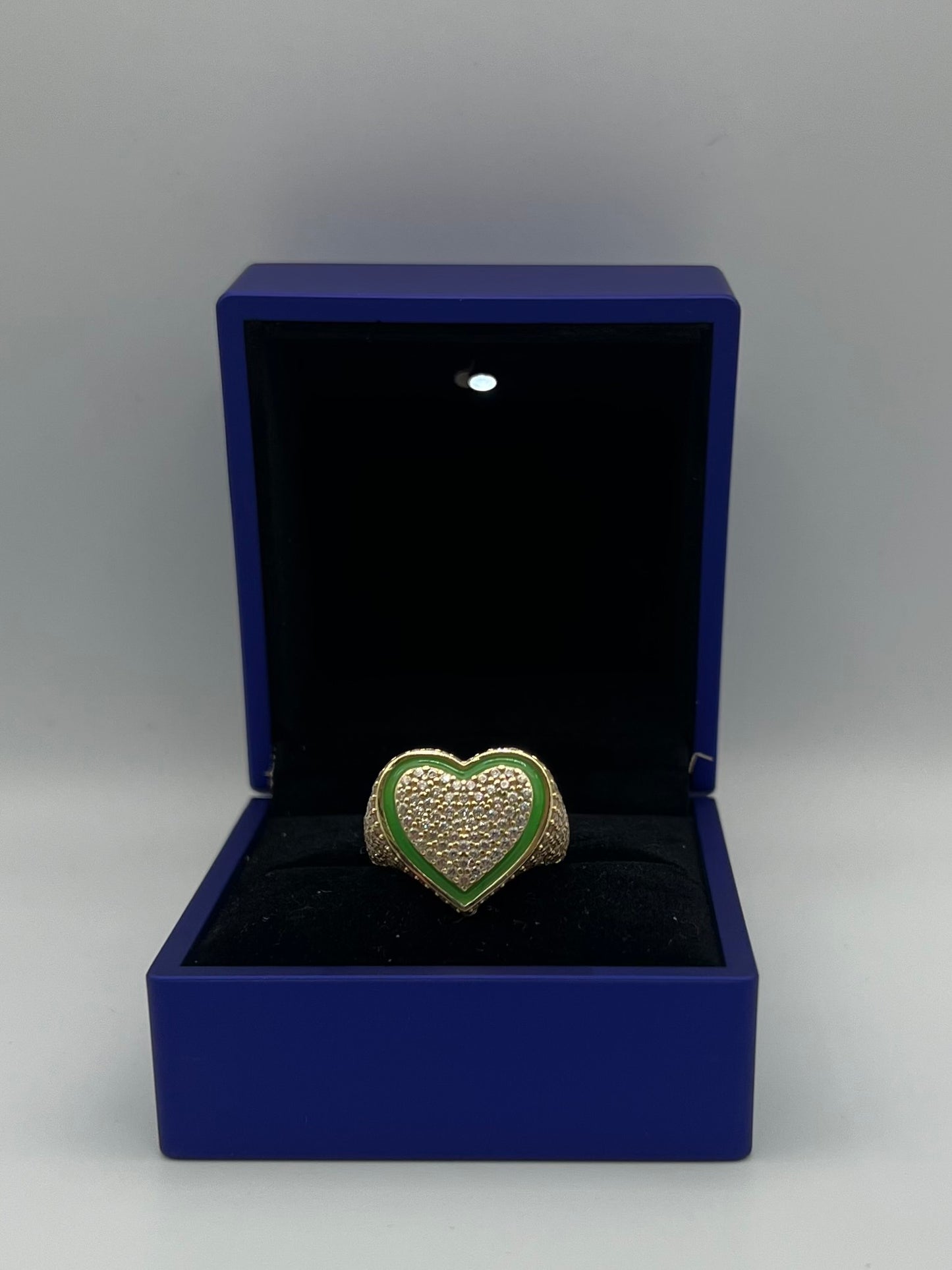 Heart design ring in color.